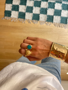 An elegant gold plated ring designed with a cheetah head, perfect for animal lovers and fashion enthusiasts.
