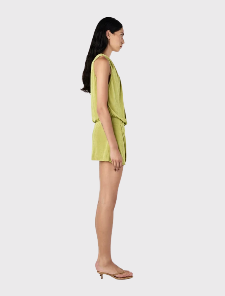 This Kiwi Chelley Mini Dress has a relaxed bodice, fitted mini skirt, deep V neckline, and elegant draped cowl detail.