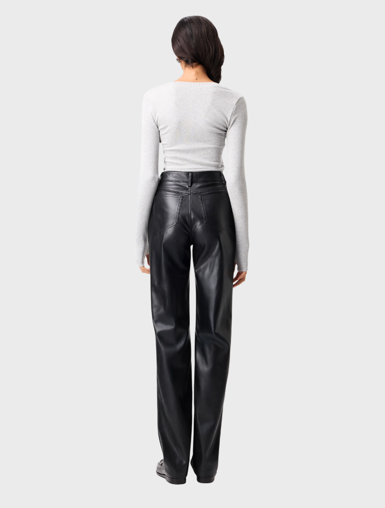 Black Fairfax pants shown on a neutral backdrop, highlighting their contemporary cut and fabric texture for everyday use.