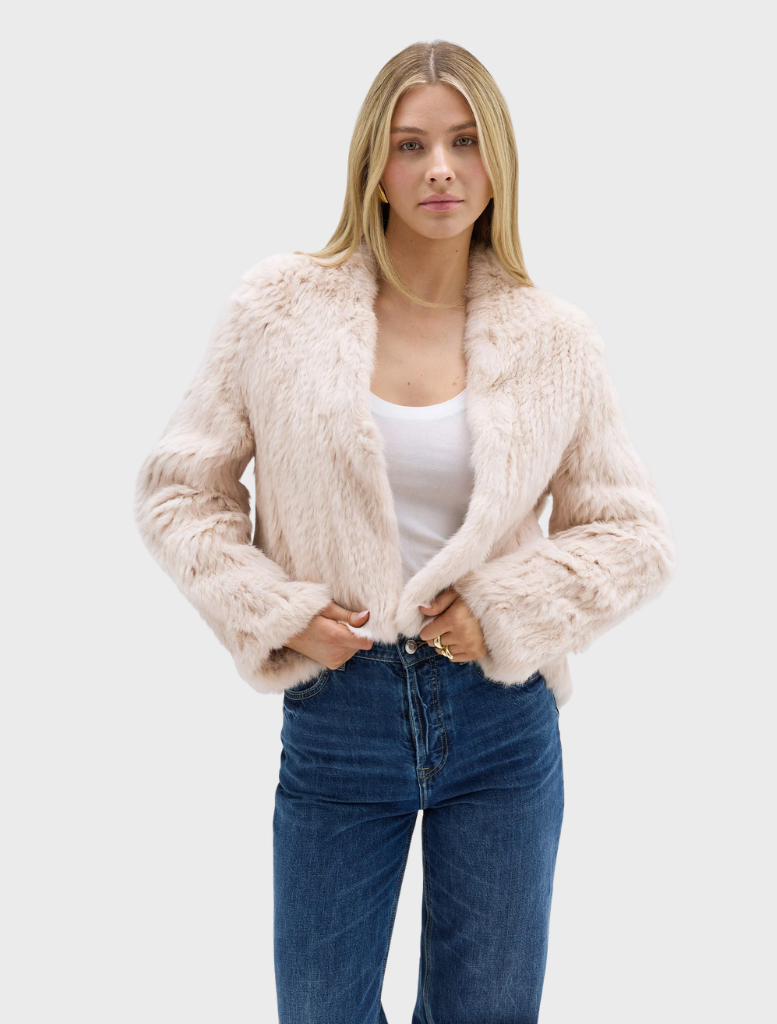 Elegant stone fur jacket by Emma, displayed to showcase its plush texture and contemporary fashion appeal.