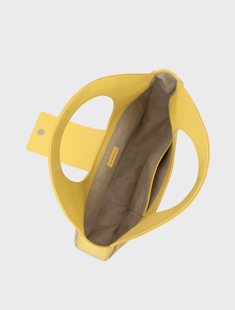 Elegant Inka Bag in a soft Butter shade, perfect for adding a touch of style to any outfit or occasion.