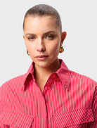 White Lincoln top featuring a classic design, suitable for casual or formal occasions.