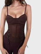 Chocolate-colored corset by Christina, featuring a structured design and elegant detailing for a flattering silhouette.