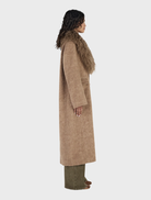 Oat Valerie Coat, a chic outerwear piece that enhances any wardrobe with its sophisticated design.