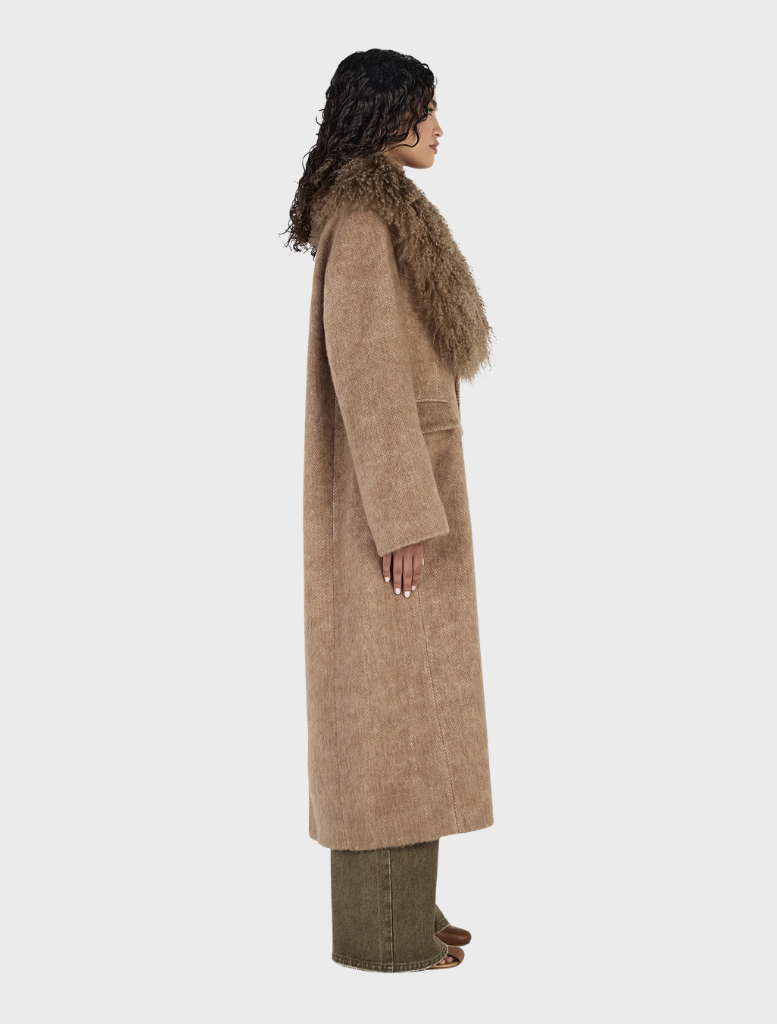 Oat Valerie Coat, a chic outerwear piece that enhances any wardrobe with its sophisticated design.