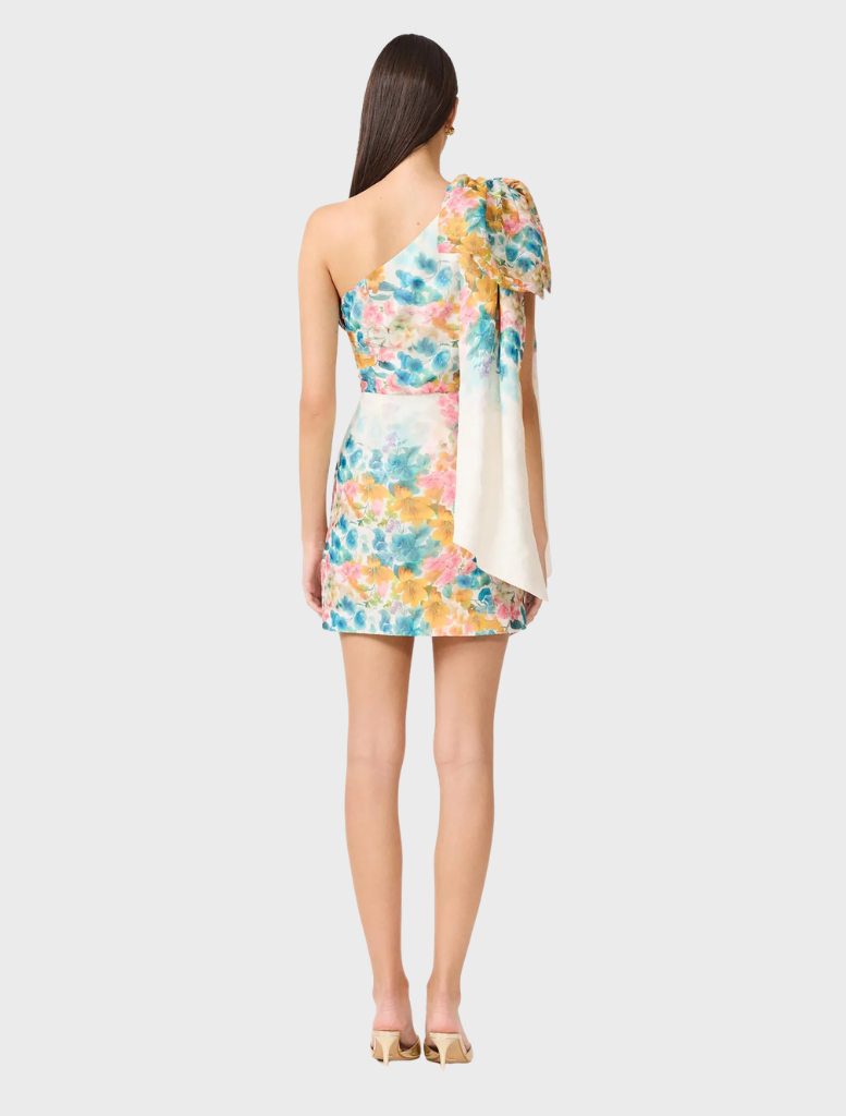 Multi floral clementina one-shoulder mini dress displayed on a mannequin, showcasing vibrant colors and elegant design.