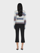 Asymmetrical cardigan in cocoa gradient, featuring a flowing design and soft fabric for a stylish layered look.