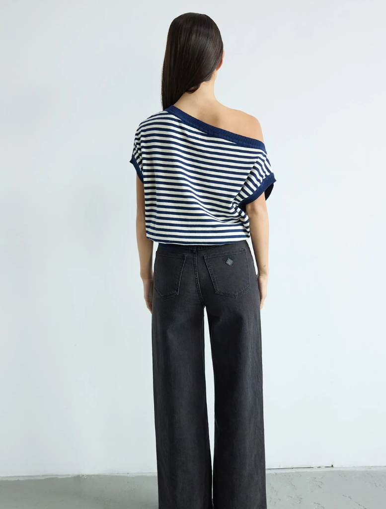 Cold shoulder knit top in blue stripes, designed with short sleeves and an elegant open shoulder style for a modern outfit.