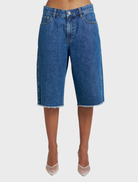 Relaxed tailored Copenhagen Short in Bleu, designed for comfort and style, perfect for coastal holidays and sunny outings.