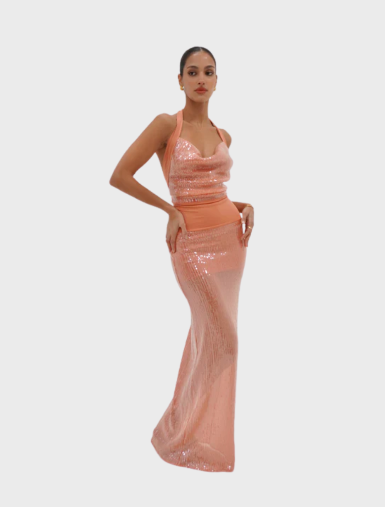 Coral Rtw Lilou Dress, showcasing a stylish cut and lightweight fabric, ideal for warm weather events.