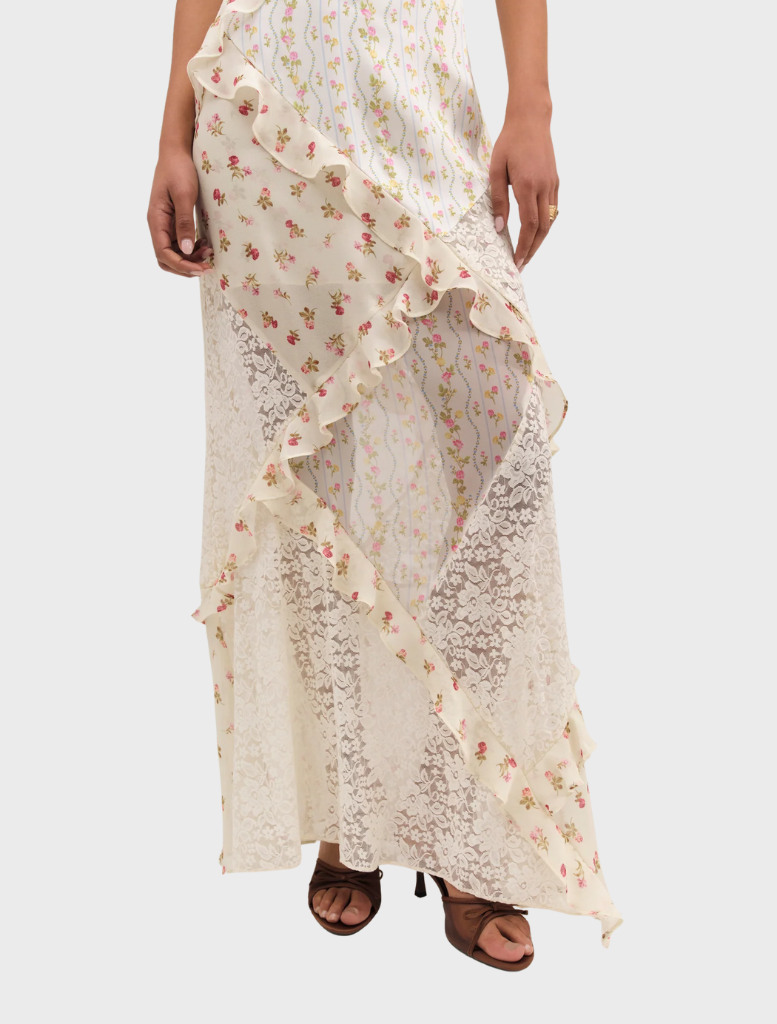  Elegant cream Josalyn Maxi Dress with a flowing design, ideal for summer events or relaxed outings.
