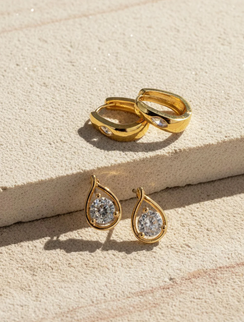 Stylish gold Cynthia Sleepers with a smooth surface, ideal for both casual and formal occasions.