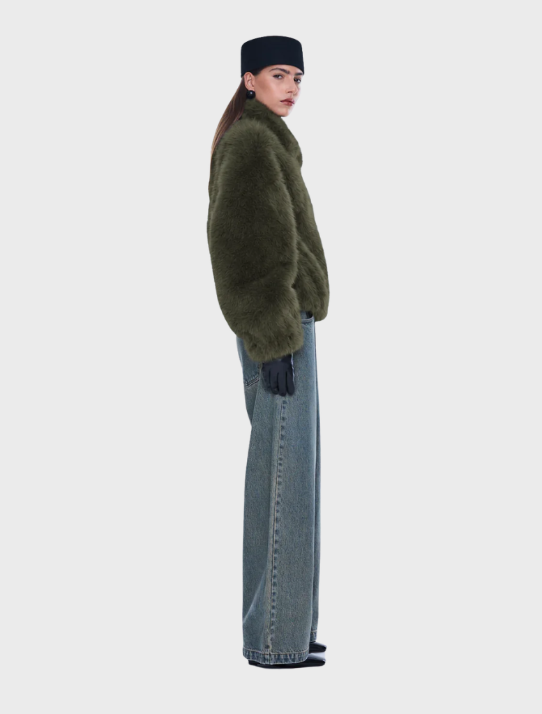 Oversized olive faux fur bomber jacket featuring a standard collar, front zipper, side pockets, and elasticated cuffs and hem.