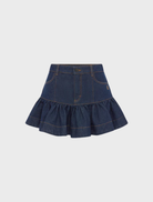 Ruffle mini skirt in deep indigo, combining elegance and playfulness for a fashionable ensemble.
