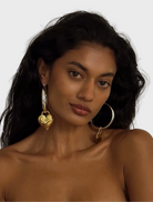  Elegant two-tone heart-shaped hoop earrings, showcasing a contemporary and chic aesthetic.