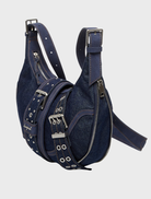 A chic dark blue denim shoulder bag, ideal for carrying essentials while adding a trendy touch to any outfit.