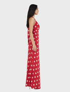 Flowy red maxi dress with a classic polka dot pattern, perfect for adding a touch of fun to your wardrobe.