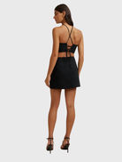 Structured Diamond Halter Mini Dress in black, pink, and orange, featuring a lace-up back and flattering fitted design.