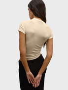 Almond Dillon raglan t-shirt with stylish contrasting sleeves, ideal for casual outings and comfortable wear.