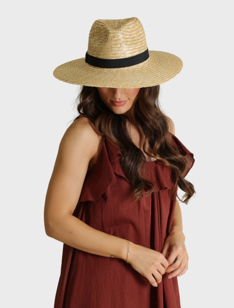 Classic black Dion Fedora hat, characterized by its wide brim and chic band, suitable for various styles.