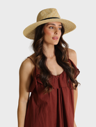 Black Dion Fedora hat with a classic design, featuring a wide brim and a stylish band around the crown.