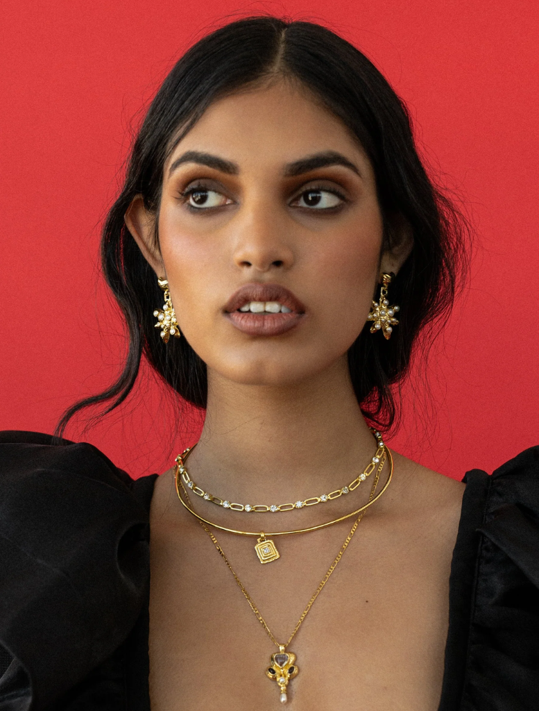 Beautiful gold Diya necklace with ornate design, perfect for adding sophistication to any outfit.