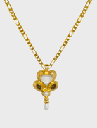 Gold Diya necklace featuring intricate design and elegant craftsmanship, perfect for formal occasions.