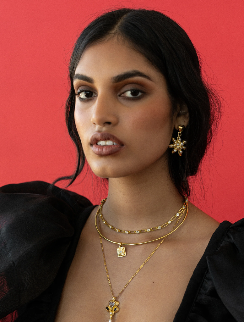 Gold Diya necklace showcasing intricate patterns, suitable for special events and celebrations.