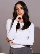White double layer top by Gia, featuring a stylish design suitable for various occasions.