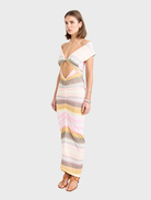 Peach Elara Dress showcasing a stylish, flowing design perfect for casual or formal events.