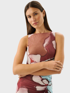 The Avalon Dress, adorned with the Marisol Bloom pattern, offers a chic and feminine style suitable for various occasions.