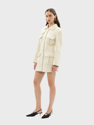 Stylish ivory Franca Wool Blazer Dress designed with a refined silhouette, ideal for both work and special occasions.