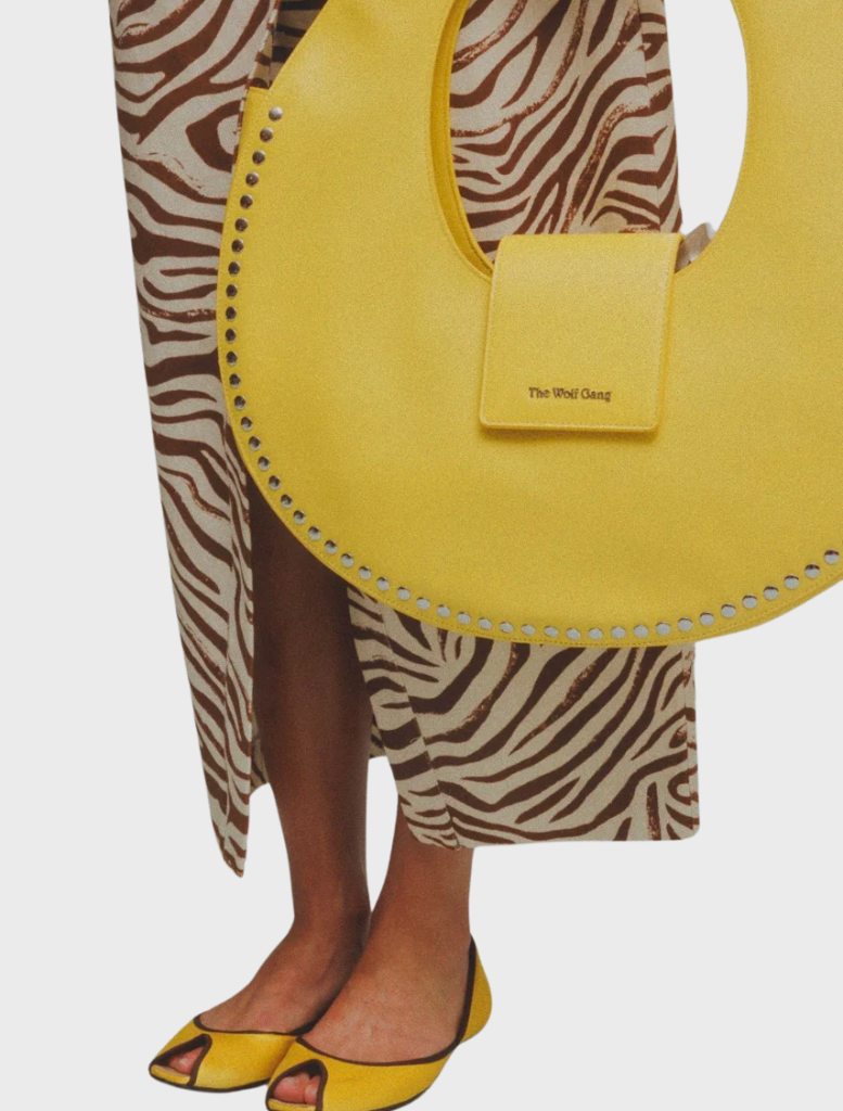 Inka Bag in a soft butter color, featuring a stylish design suitable for various occasions.
