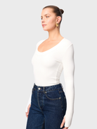 White Lincoln top showcasing a clean, minimalist style ideal for both everyday wear and special events.