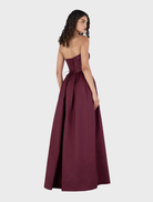 Stylish Portia Maxi Dress in Mulberry, featuring a chic, flowing design suitable for various occasions.