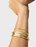 Elegant gold Elva bracelet with intricate detailing, ideal for enhancing your jewelry collection.