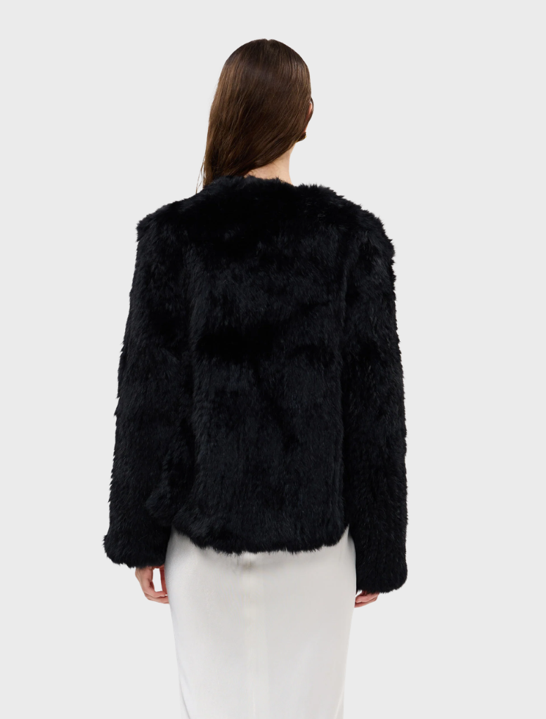 Black Emma Jacket on display, highlighting its elegant style and tailored fit, perfect for layering in any season.