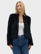 Black Emma Jacket showcased, featuring a refined look and tailored structure, ideal for versatile wardrobe styling.