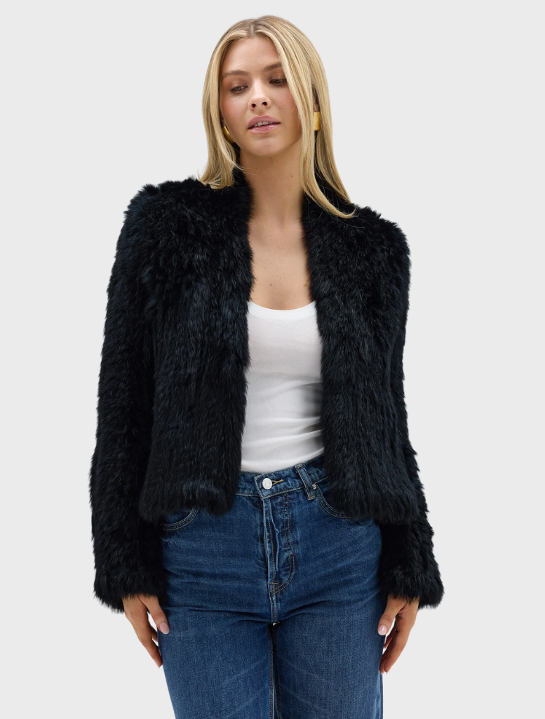 Black Emma Jacket showcased, featuring a refined look and tailored structure, ideal for versatile wardrobe styling.
