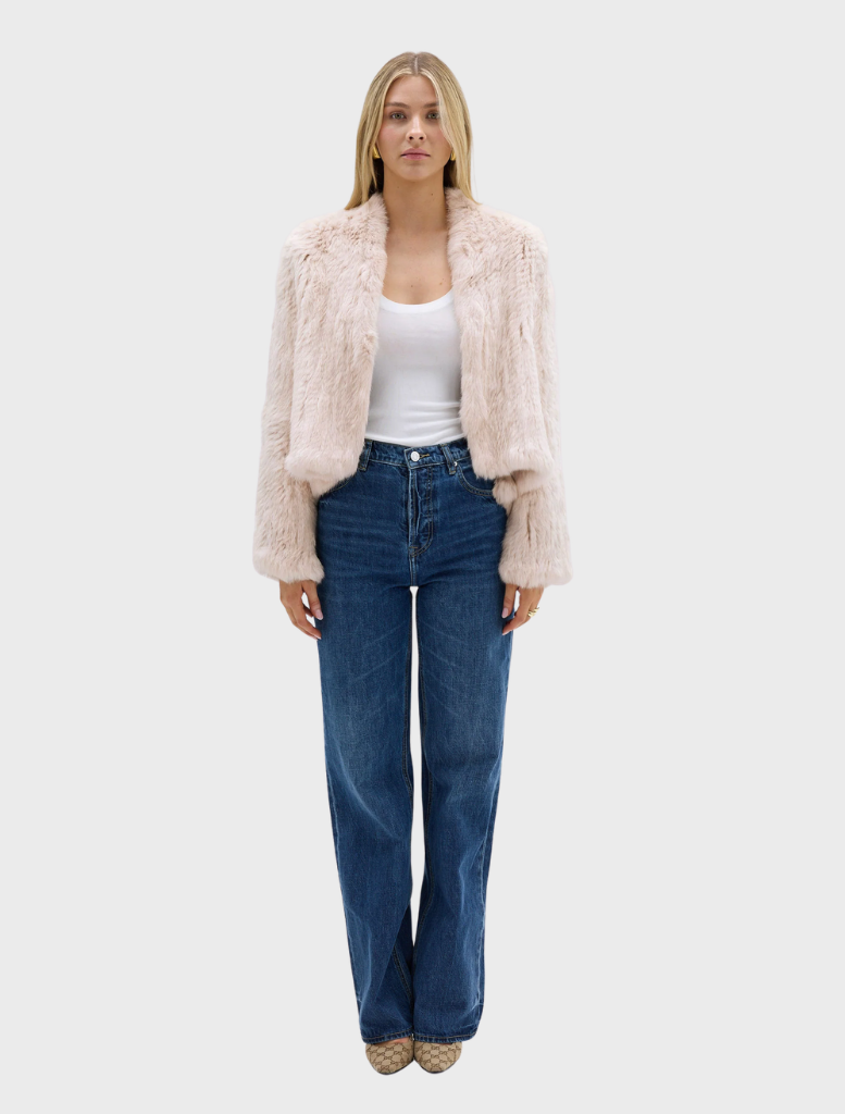Elegant stone fur jacket by Emma, displayed to showcase its plush texture and contemporary fashion appeal.