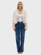  Emma Jacket, crafted from rabbit fur in stone, features an open front and a fashionable design with a short front and longer back.