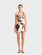 Emmett Halter Draped Mini Dress in a redwood wallpaper pattern, featuring a stylish halter neckline and draped design.