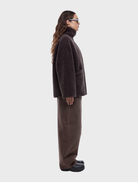Espresso Jayla Teddy Jacket, designed with a plush exterior and a modern fit, perfect for stylish layering in colder weather.