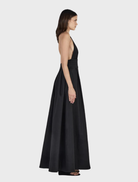 Timeless black Evalina Taffeta gown with a luxurious finish and elegant lines, perfect for upscale events.