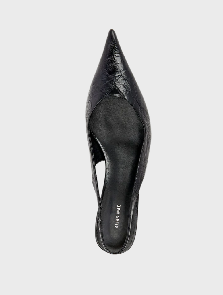 Elegant black leather sling heel shoe featuring a pointed toe, crafted from Evette's black oily crinkle leather.