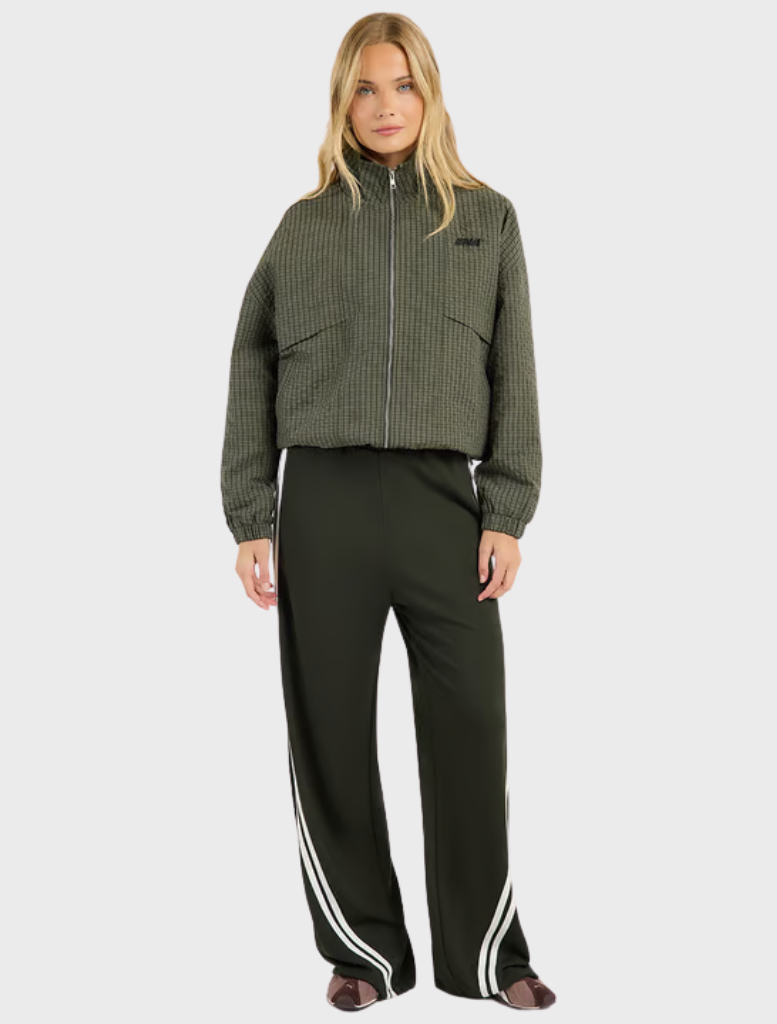 Structured olive check zip jacket with a funnel neck and two-way zip, offering a relaxed fit and modern design elements.