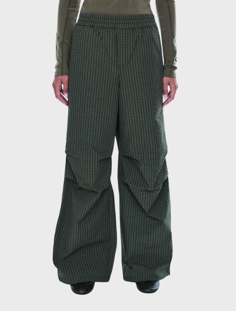 Olive check relaxed pull-on pant with wide legs, elastic waistband, and adjustable hems, ideal for a contemporary outfit.