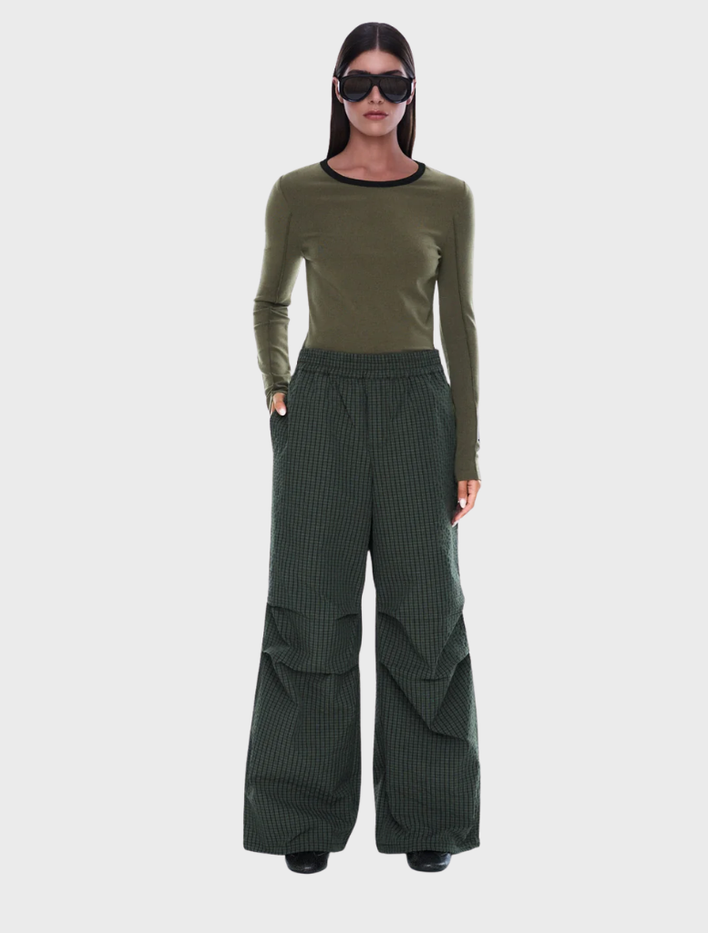 Olive check wide-leg pull-on pant with elastic waistband and adjustable drawcord hems for a relaxed fit and contemporary style.