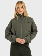 Olive check zip-through jacket featuring a funnel neck, two-way zip, and angled welt pockets for a relaxed fit.
