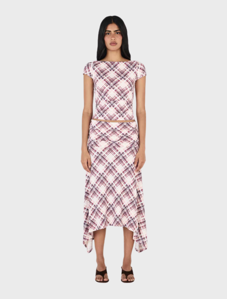 Farrah Midi Skirt in berry plaid pattern, featuring a stylish and feminine design suitable for various occasions.